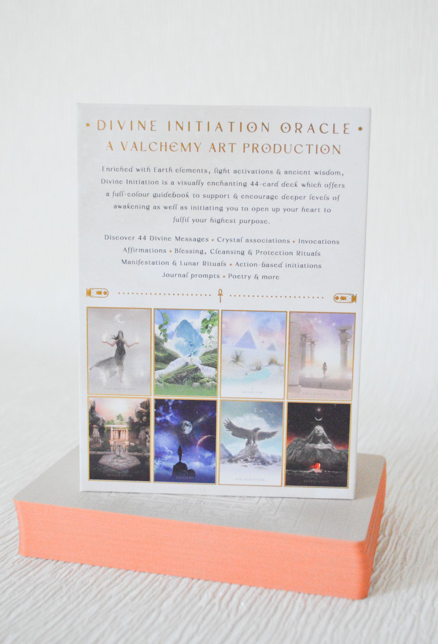 Egyptian oracle deck with magnetic box and peachy orange card edges
